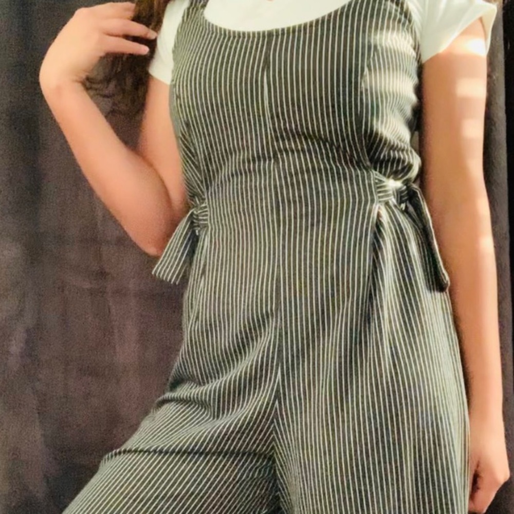 Black and white striped jump suit